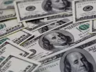 Dólar volta a subir após dois dias de queda, com impacto de fatores técnicos e tensões comerciais.