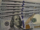 Dólar recua ante pares com Powell e tarifas no radar