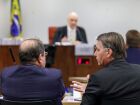 O ex-presidente Jair Bolsonaro e, ao fundo, o ministro Alexandre de Moraes , durante interragatório no STF