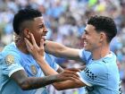 Savinho e Foden comemoram gol em vitória arrasadora do Manchester City sobre a Juventus em Orlando. 