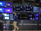 Bolsas de NY fecham em alta, em sessão volátil de olho em tensões, e com alívio após ataques