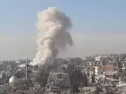 Foto mostra fumaça subindo em local de Damasco, na Síria, que foi alvo de um provável ataque israelense, segundo a mídia estatal síria