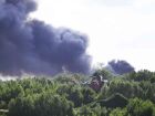 Fumaça causada por um incêndio se espalha sobre o local do festival de música eletrônica Tomorrowland em Boom, no norte da Bélgica, em 16 de julho de 2025.