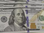Bolsa bate recorde, e dólar cai para menor valor em mais de um ano
