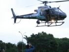 Helicóptero da PM sobrevoa bairros de Campo Grande em nova estratégia de patrulhamento integrado.