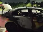 Carro Jetta ficou totalmente destruído após pegar fogo em acidente na rotatória da Avenida Doutor Fadel Tajher Iunes, no Bairro Carandá Bosque, em Campo Grande.