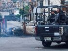 Cenário de guerra durante megaoperação da polícia no Complexo do Alemão, zona norte do Rio.