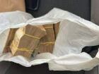 Pacote com maços de dinheiro apreendido pela Polícia Federal durante flagrante de propina em Campo Grande. Quantia totalizava R$ 160 mil.  