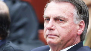 O ex-presidente Jair Bolsonaro durante o primeiro dia de julgamento do STF que analisa denúncia por tentativa de golpe de Estado