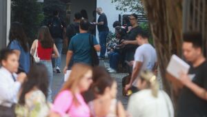 Candidatos chegando para a realização do Concurso Nacional Unificado, o 