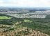 Vista aérea de loteamento planejado desenvolvido pela Financial, com foco em urbanismo sustentável e expansão regional