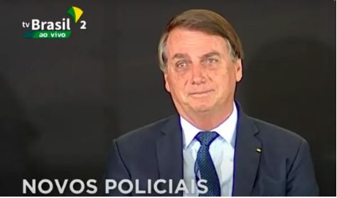 O presidente Jair Bolsonaro no palco do evento