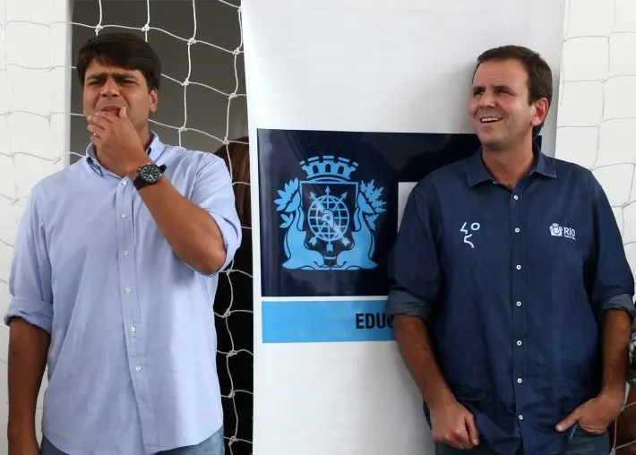 Pedro Paulo (à esq) e Eduardo Paes