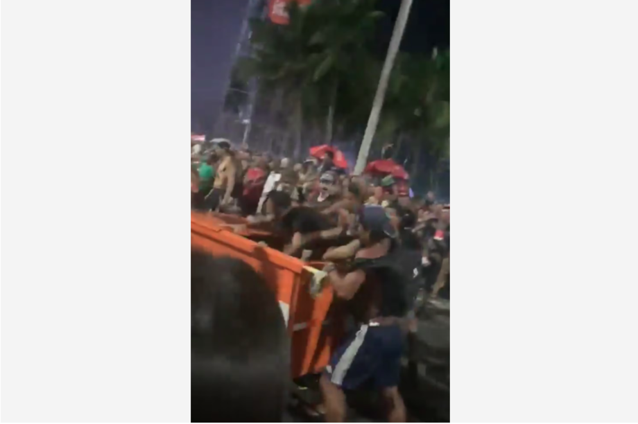 Homem é agredido e jogado no lixo antes de show da Madonna no Rio.