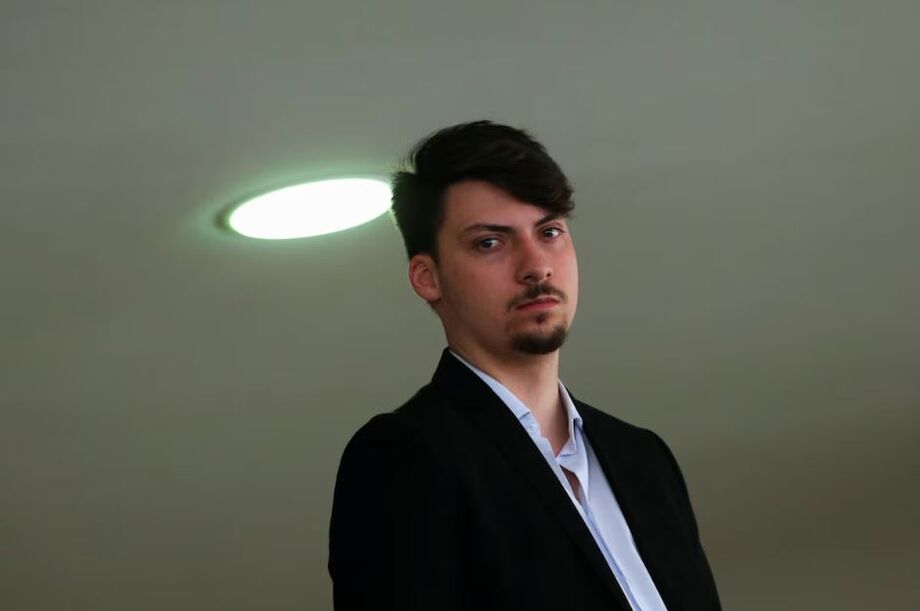 Jair Renan Bolsonaro, o filho 04 de Bolsonaro, no Planalto durante celebração do Dia Internacional contra a Corrupção, em 2021