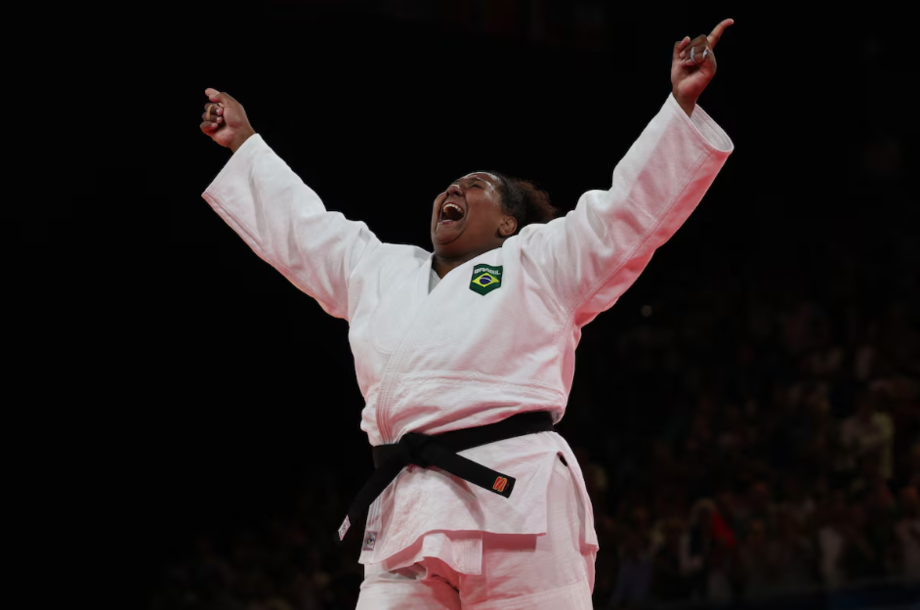 Brazil's Beatriz Souza reacts after beating Israel's Raz Hershko (Blue) in the judo women's +78kg gold medal bout of the Paris 2024 Olympic Games at the Champ-de-Mars Arena, in Paris on August 2, 2024.