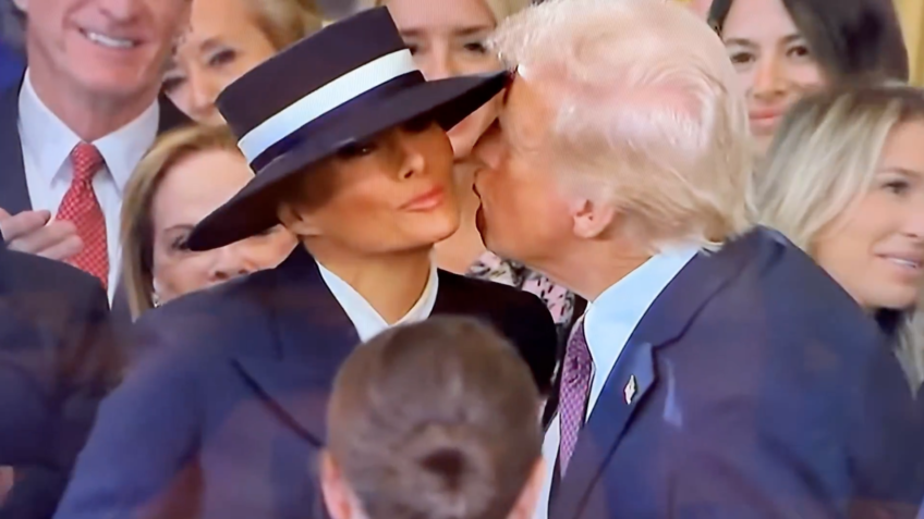 Internautas transformam momento inusitado em memes; acessório de aba larga ofuscou beijo entre o casal