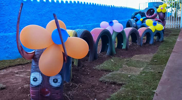 Pneus reciclados serão usados para criar brinquedos e canteiros em escolas de Campo Grande.