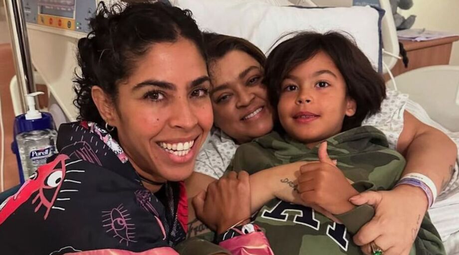 Bela Gil com seu filho caçula, Nino, durante visita à irmã Preta Gil no hospital