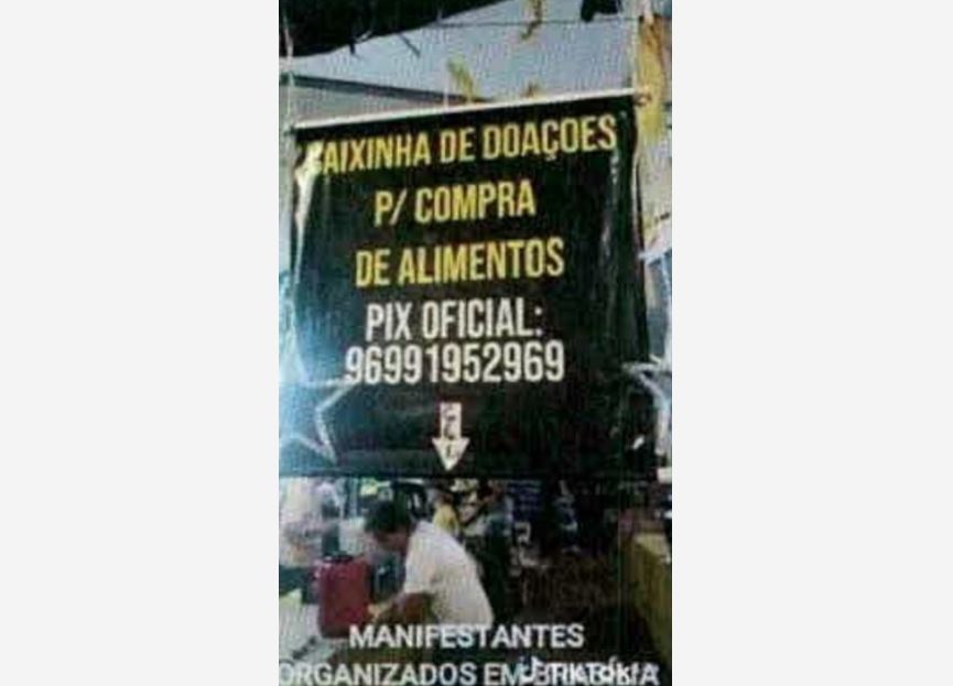 Cartaz com pedido de doação na Barraca do Abdalla.