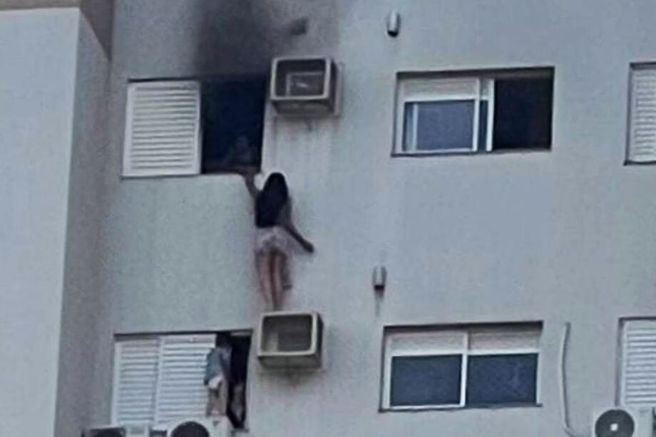 Incêndio atingiu apartamento no 13º andar em Cascavel; Juliane salvou a família se pendurando no ar-condicionado