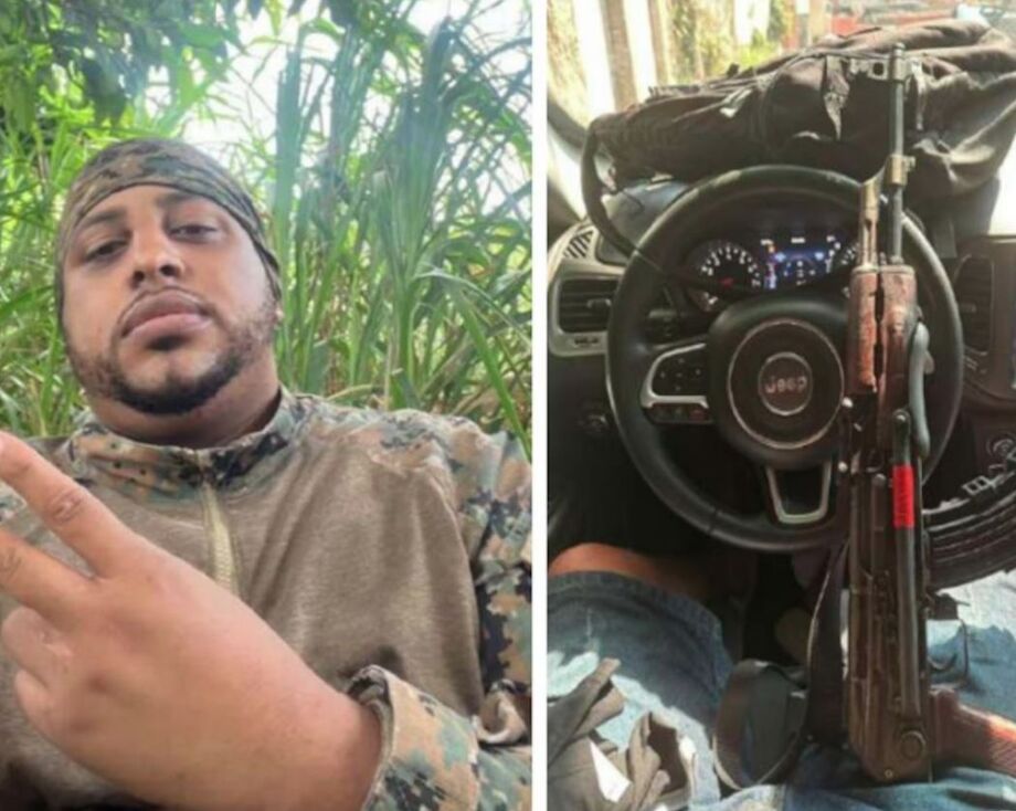 Juan Breno, conhecido como BMW, aparece em zona de mata utilizando roupa camuflada específica de guerrilha e portanddo um fuzil.