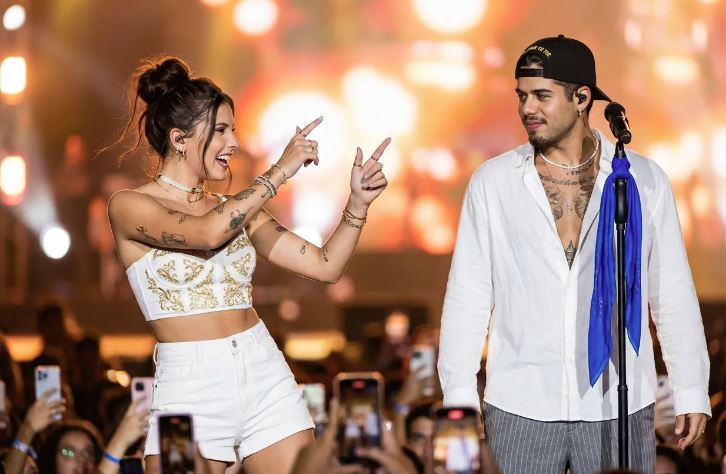 Zé Felipe participa de show de Ana Castela em cruzeiro e canta com a sertaneja após anúncio do término.