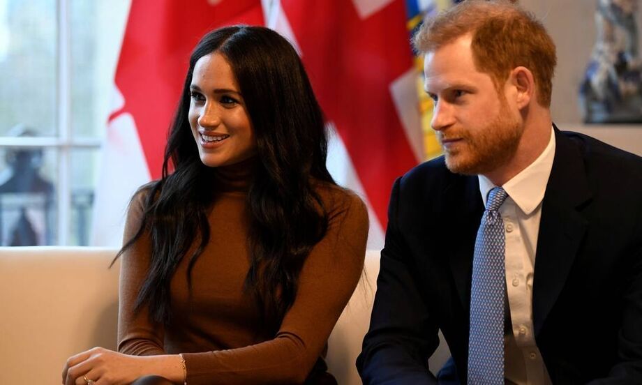 O príncipe Harry e sua mulher Meghan