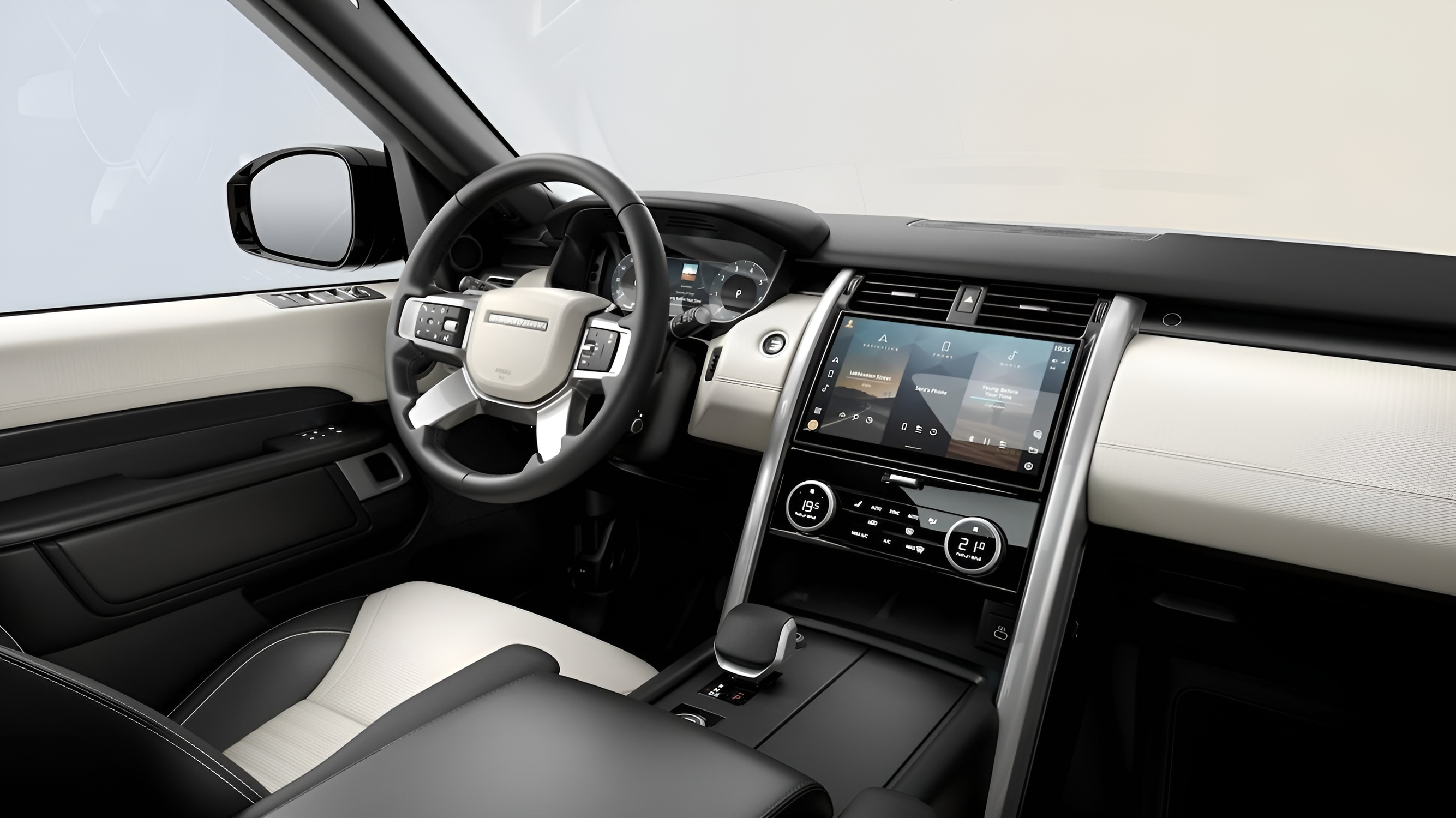 O interior sofisticado do Land Rover Discovery 2025 combina materiais premium com tecnologia de ponta, oferecendo uma experiência de condução confortável e intuitiva.